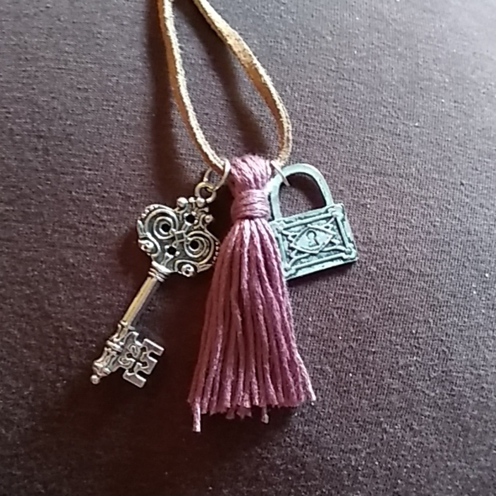 Tassle with lock and key charms